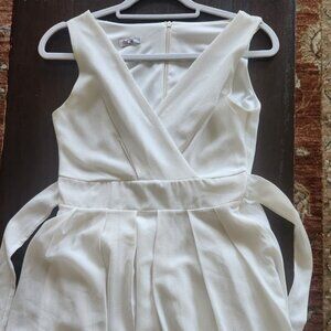 Beautiful A-line dress with flare- lovely white dress and works for bridal showe